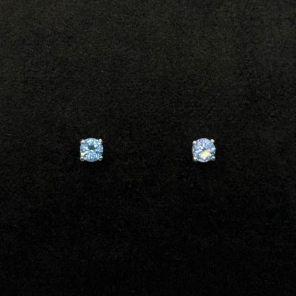 Orecchini Punto Luce Oro Bianco 18 kt e Topazio Azzurro